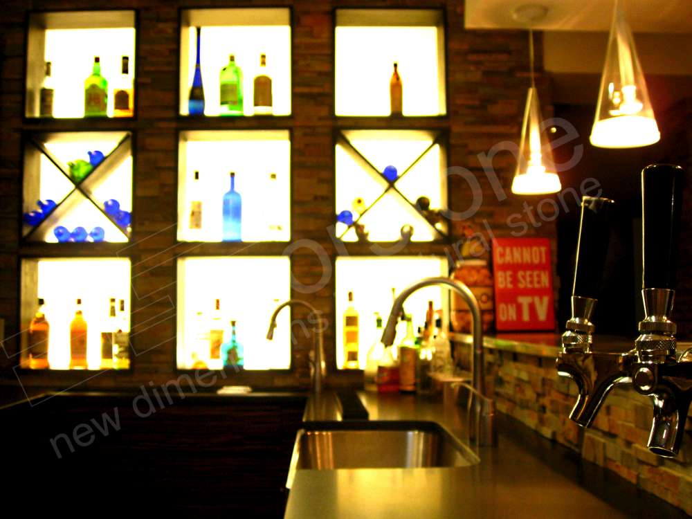 Norstone Ochre Rock Panels on a bar backsplash and surrounding wall in a basement man cave